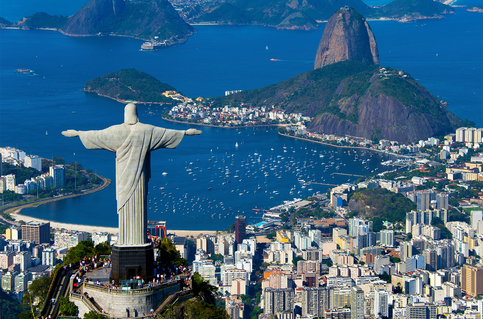 View of Rio skyline with Christ the Redeemer statue in foreground